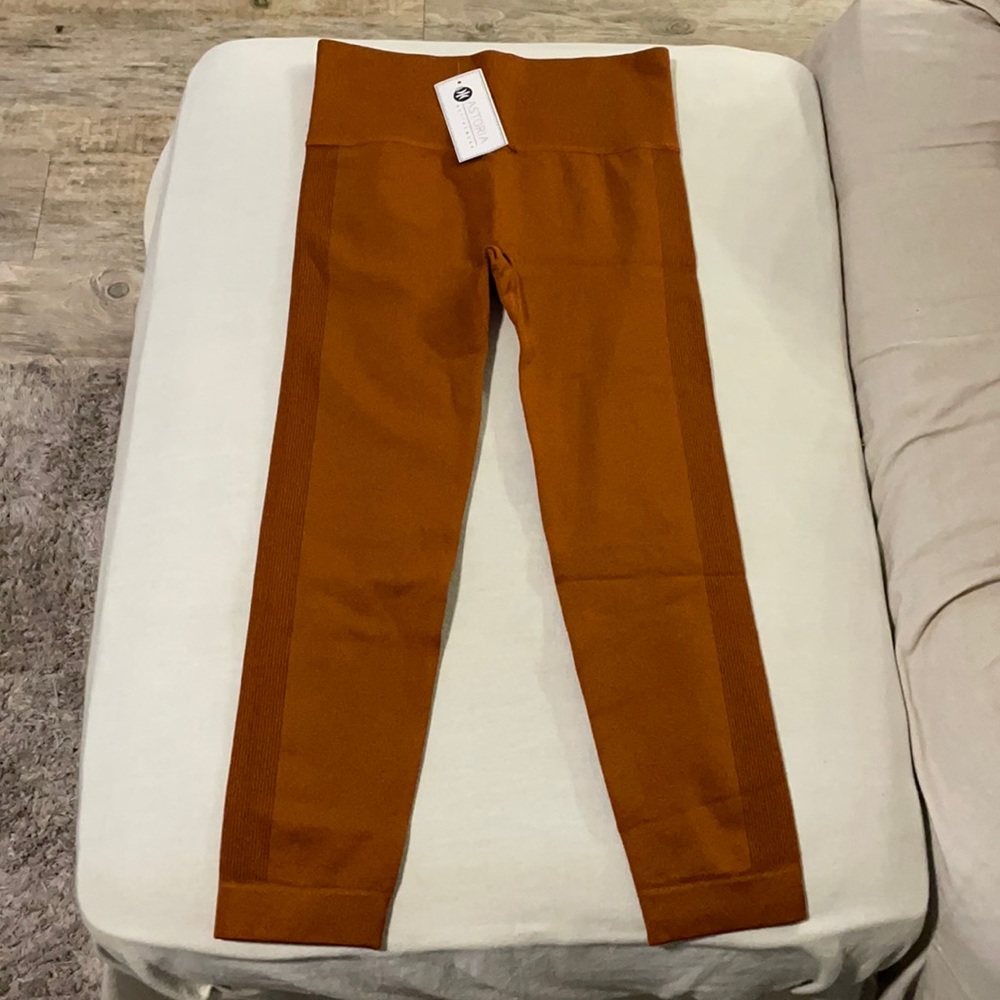 ASTORIA Activewear.  Burnt orange leggings. NWT.
